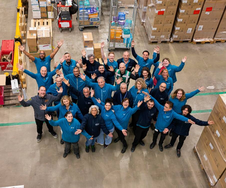 Groepsfoto in vogelperspectief van de collega's van team Device en Depot Operations